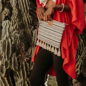 Stylish Black and White Tassel Clutch